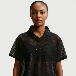 Nike ruimvallende poloshirt van jersey met kant voor dames - Zwart