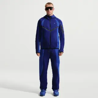Nike Tech fleecebroek met kleurblokken en open zoom voor heren - Blauw