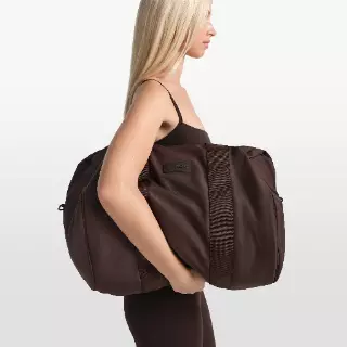 NikeSKIMS gewatteerde sporttas - Bruin