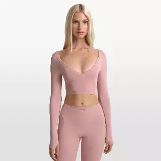 NikeSKIMS Stretch Knit wikkeltop met lange mouwen voor dames - Roze