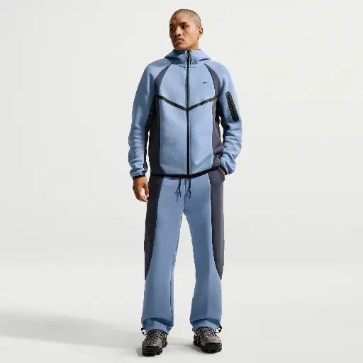 Nike Tech fleecebroek met kleurblokken en open zoom voor heren - Blauw