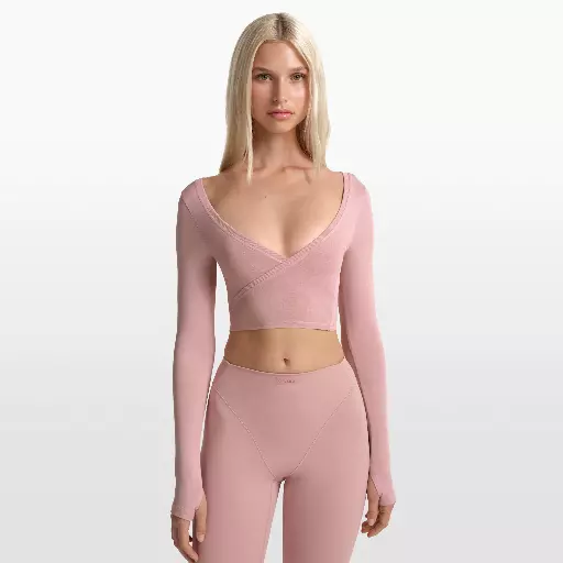 NikeSKIMS Stretch Knit wikkeltop met lange mouwen voor dames - Roze
