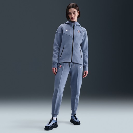 Paris Saint-Germain Tech Nike voetbaljoggingbroek van fleece met halfhoge taille voor dames - Blauw